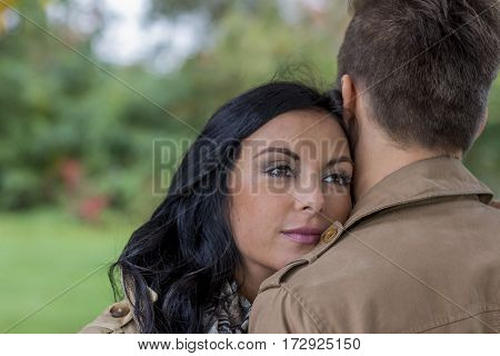 amorous couple in a park