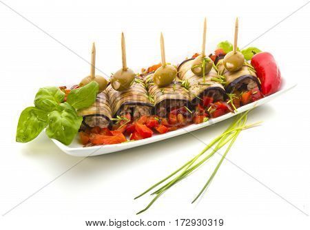 Rollers with aubergines and paprika olive onion on white background