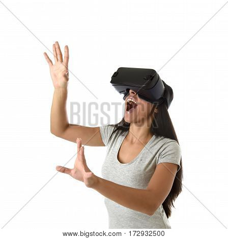 young attractive happy woman excited using 3d goggles watching 360 virtual reality vision enjoying cyber fun experience in vr simulation reality and new gaming technology isolated white background