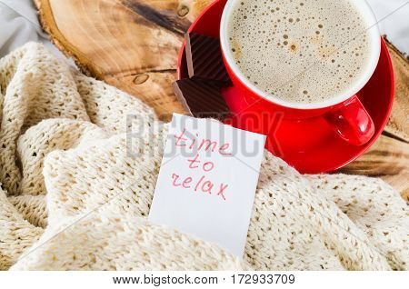 Cup of Hot Cappuccino and Chocolate in the Bed Notes Time to Relax Lazy Morning. Selective Focus.
