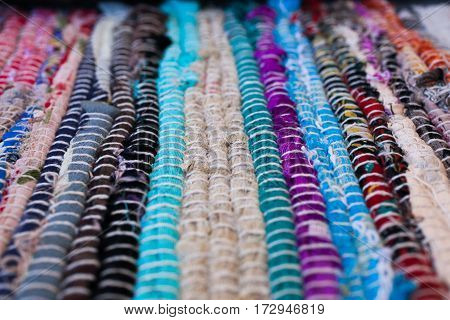 Colorful carpet texture. Background of andalusian carpet. Jarapa. Handmade carpet. Close up of beautiful hand made carpet. Abstract background and texture for designers.