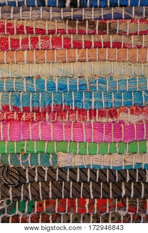 Colorful carpet texture. Background of andalusian carpet. Jarapa. Handmade carpet. Close up of beautiful hand made carpet. Abstract background and texture for designers.