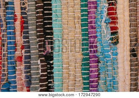 Colorful carpet texture. Background of andalusian carpet. Jarapa. Handmade carpet. Close up of beautiful hand made carpet. Abstract background and texture for designers.