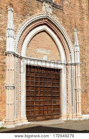 side entrance to the Basilica di Santa Maria Gloriosa dei Frari, Venice, Italy