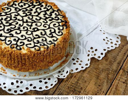 Homemade Cake With Nut Meringue Butter Cream And Decorated With Swirls Of Dark Chocolate. Kyiv Cake