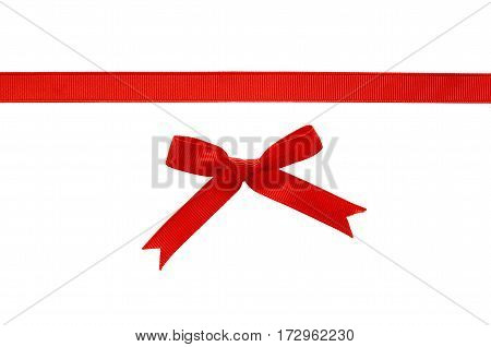 Red rep ribbon and bow isolated on white