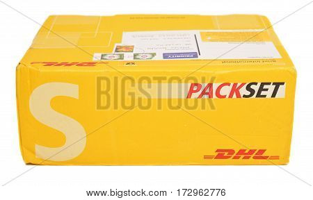 Caransebes Romania - December 16 2016: A DHL package isolated on a white background. Shot taken on December 16 2016