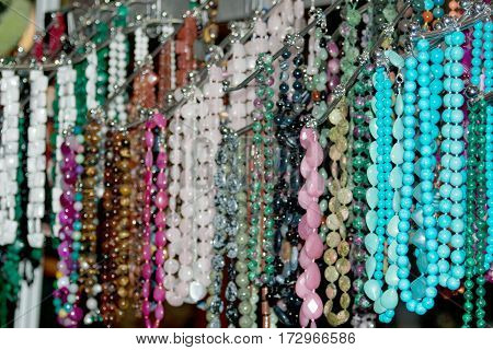 Colorful multi-colored beads and necklaces on the market