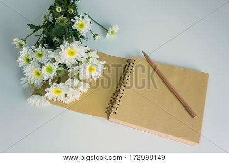 Blank Area Note Book Or Diary With Flower