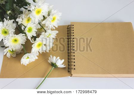 Blank Area Note Book Or Diary With Flower