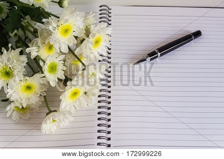 Blank Area Note Book Or Diary With Flower