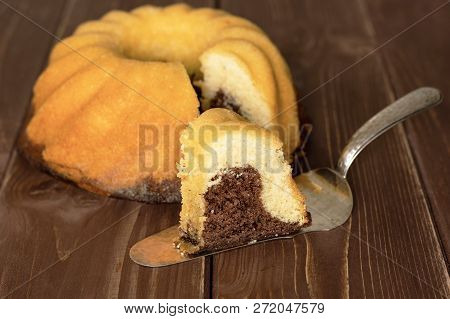 Group Of One Whole One Slice Of Fresh Baked Marble Gugelhupf Sweet Bread Variety One Piece Is In Foc