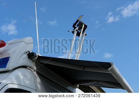 Satellite Tv Van With Mobile Antenna Transmitting News Event For Broadcasting