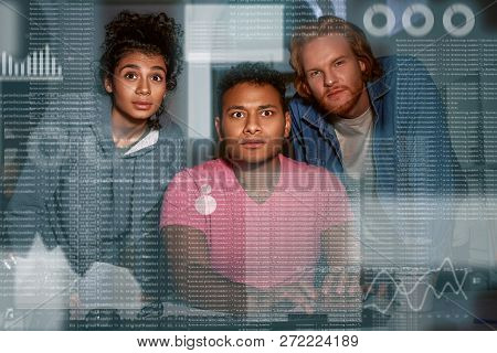 Young Team Of Data Analysts Are Looking Over The Data