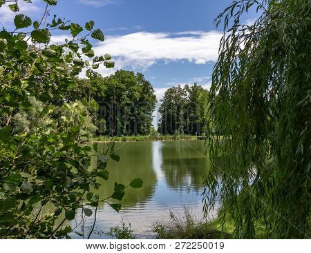 Reflection Of Trees And Sky In The Fourth Lake In Maksimir Park, Zagreb, Croatia