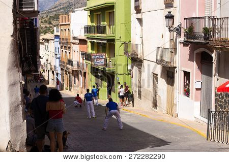 Relleu, Spain-june 24, 2018: Traditional Pelota Valenciana Match Played On An Old Town Street With G