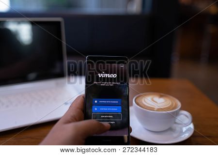 Chiang Mai, Thailand - May 19,2018: Man Hands Holding Huawei With Vimeo On Screen.  Vimeo Is A Video