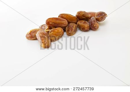 Date Fruits Over White Background