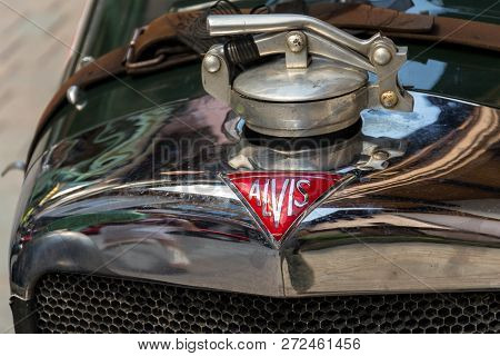 Saalbach-hinterglemm, Austria - June 21 2018: Vintage Alvis Oldsmobile Veteran Car Standing On Stree