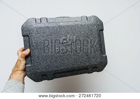 Paris, France - Nov 22, 2018: Man Hand Holding Against White Background New Dji Ronin S Superior 3-a