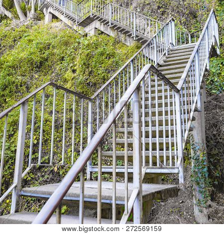 Stairs At The Side Of A Mountain With Vines