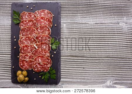 Saucisson Sec Delicious French Salami On A Wooden Background