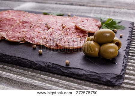 Saucisson Sec Delicious French Salami On A Wooden Background