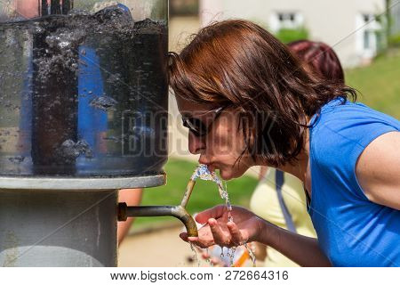 Luhacovice, Czech Republic - April 30 2018: People Drinking From Public Natural Healing Mineral Stre