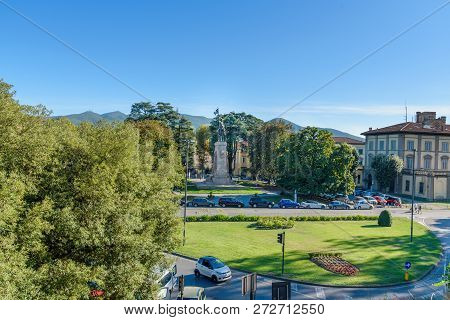 Lucca, Italy - September 25, 2018: View On Piazza Risorgimento With Equestrian Statue From Medieval 