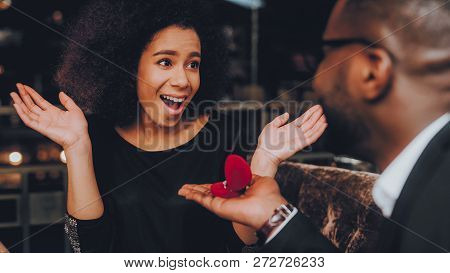 African Handsome Man Proposing To Girlfriend. Romantic Couple In Love Dating. Cutel Man And Girl In 