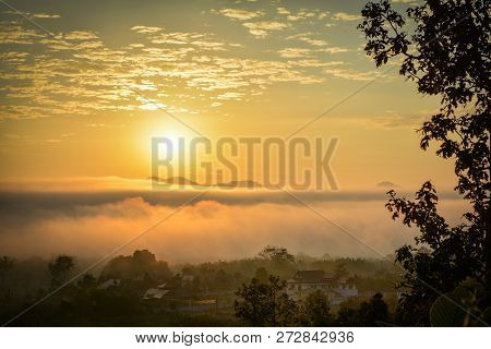Winter Sunrise / Beautiful Morning With Fog Sunrise Over Misty On Meadow And In Village