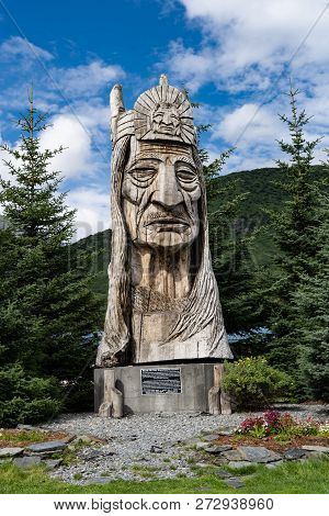 August 9 2018 - Valdez, Ak: Trail Of The Whispering Giants Totem Pole Statue In Valdez Alaska, By Ar