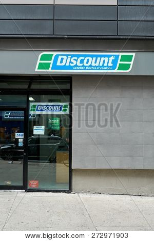 Montreal, Canada - October 6, 2018: Discount Car And Truck Rentals Service Office And Logo. Discount