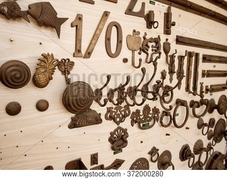 A Lot Of Hooks On Wood Show In A Shop For Sale