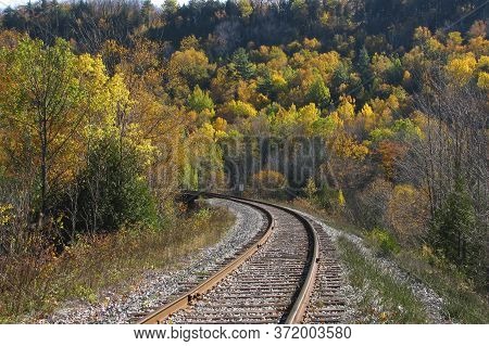 Vibrant Autumn Colours With Railroad Track At Credit River Valley In Caledon, Ontario, Canada