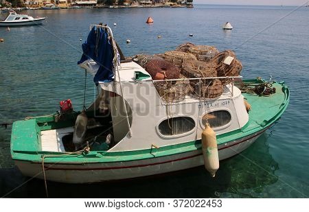 Symi, Greece - June 14, 2020: Fishing Boats In The Port Of Symi Town, Symi Island, Greece