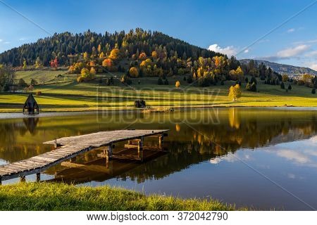 autumn pond under the mountains, Murau district,
Styria, Austria