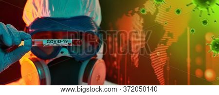 COVID-19 or 2019-nCoV. Close-up portrait of a scientist microbiologist in a protective PPE suit showing the coronavirus test tube. Background of the world map and virus molecules.