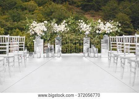 Beautiful Decorations On Wedding Celebration Ceremony Outdoors. Nature Background