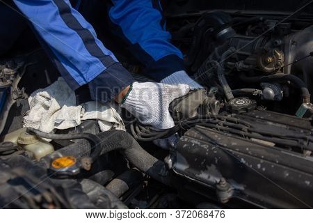 Check Engine Ignition System And Change Ignition Coil. Car Care Service.
Replacing Ignition Coil And