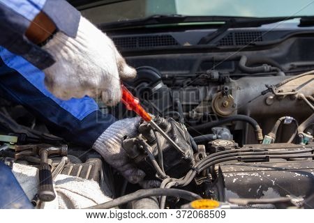 Check Engine Ignition System And Change Ignition Coil. Car Care Service.
Replacing Ignition Coil And