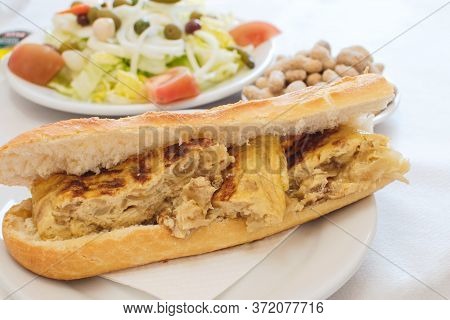 Omelette Baguette A Salad And Peanuts Delicious