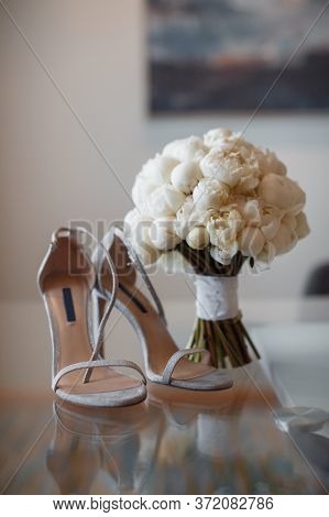 Beautiful Fresh Wedding Bouquet With Brides Shoes
