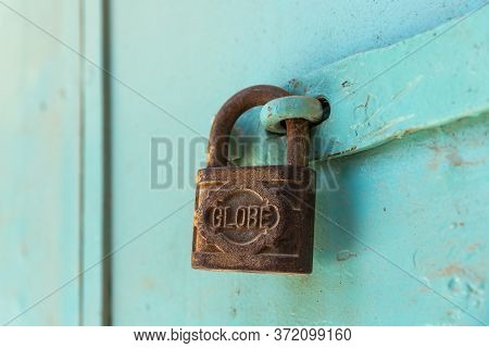 Jerusalem, Israel, June 13, 2020 : A Large Old Metal Lock Hanging On A Metal Door On Muristan Street