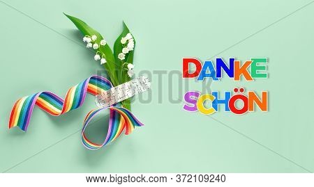 Text Danke Shon In German Language Means Thank You . Rainbow Ribbon, Lily Of The Valley Flowers. Bou