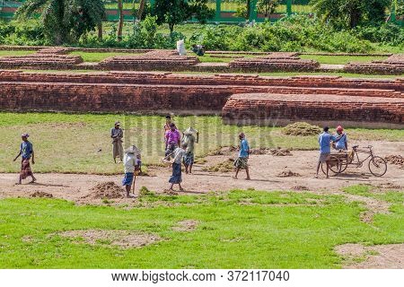 Paharpur, Bangladesh - November 6, 2016: Local Workers At Somapuri Vihara Somapura Mahavihara , Ruin