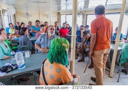 Pasur, Bangladesh - November 13, 2016: Tourists Aboard M. V. Dinghy Ship Of The Bengal Tours Ltd. He