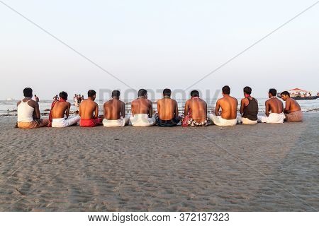 Dublar Char, Bangladesh - November 14, 2016: Hindu Devotees Praying Before Their Holy Dip During Ras