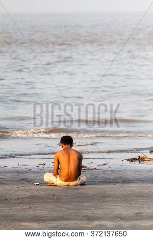 Dublar Char, Bangladesh - November 14, 2016: Hindu Devotee Praying Before Their Holy Dip During Rash