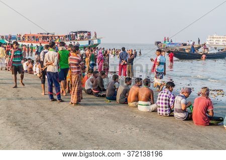 Dublar Char, Bangladesh - November 14, 2016: Hindu Devotees Praying Before Their Holy Dip During Ras